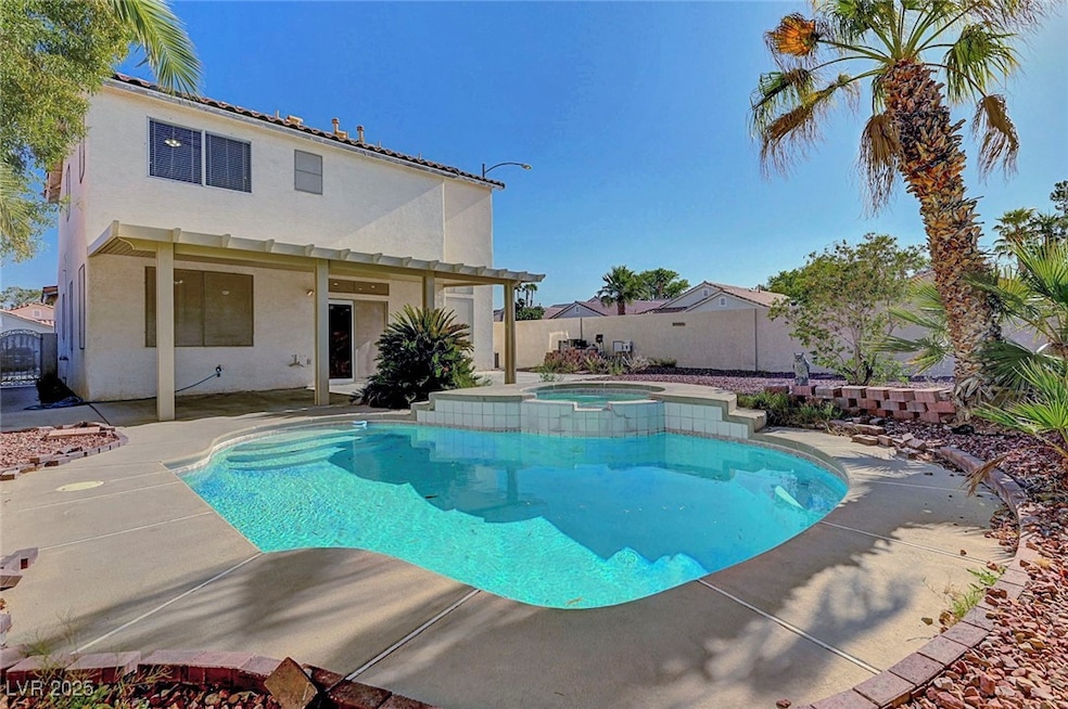 View of swimming pool featuring a fenced backyard,