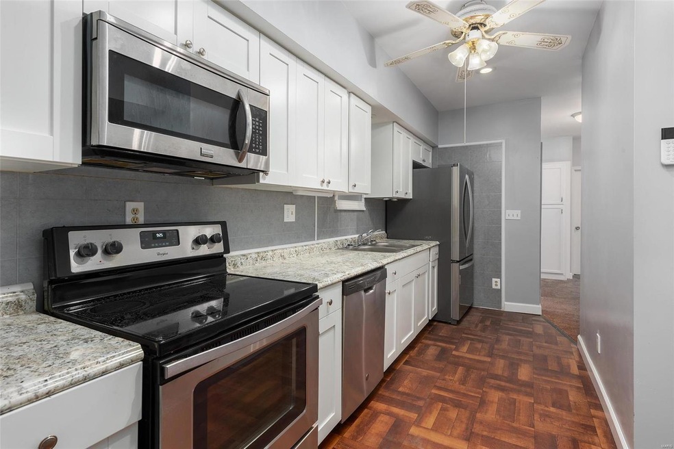 Galley kitchen w/ eat in ledge