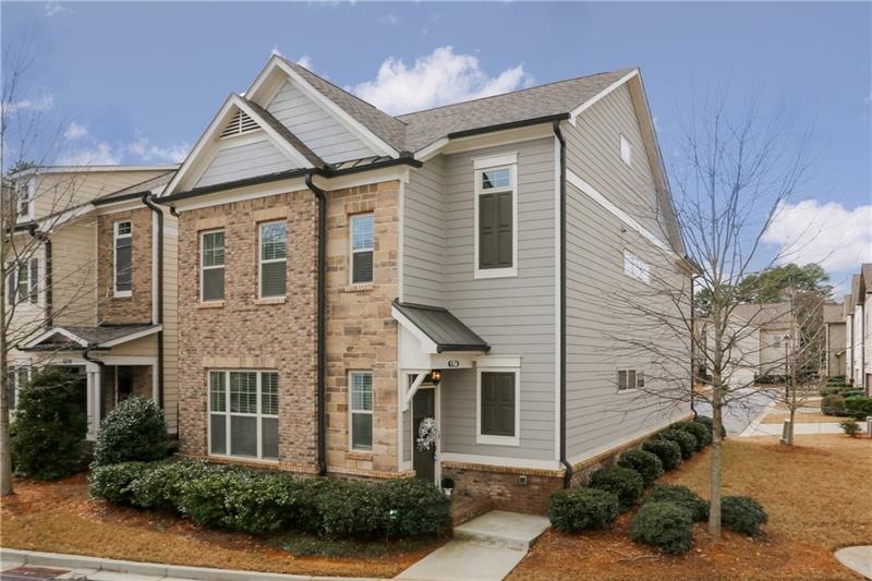 Charming brick and stone exterior with brick water