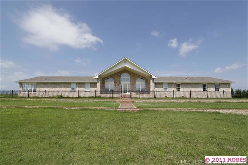 Beautiful 1 story brick on 8+ acres m/l, built in