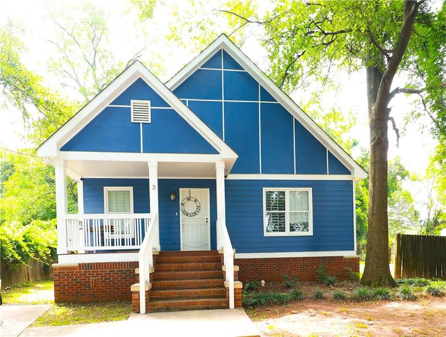 Bungalow-style home with a porch