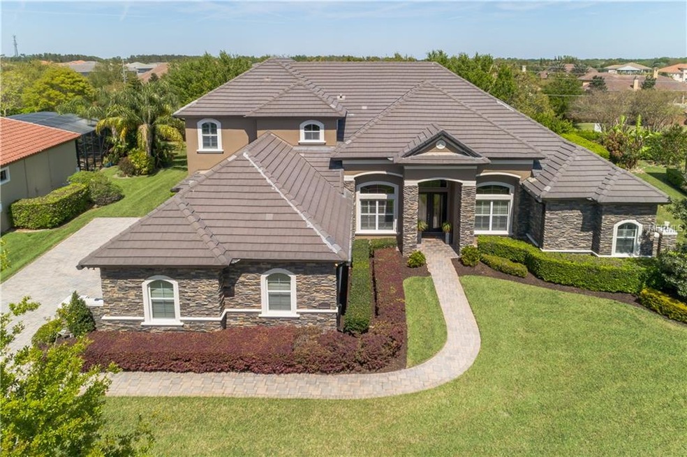 STACKED STONE AND TILE ROOF ARE JUST A FEW OF THE 