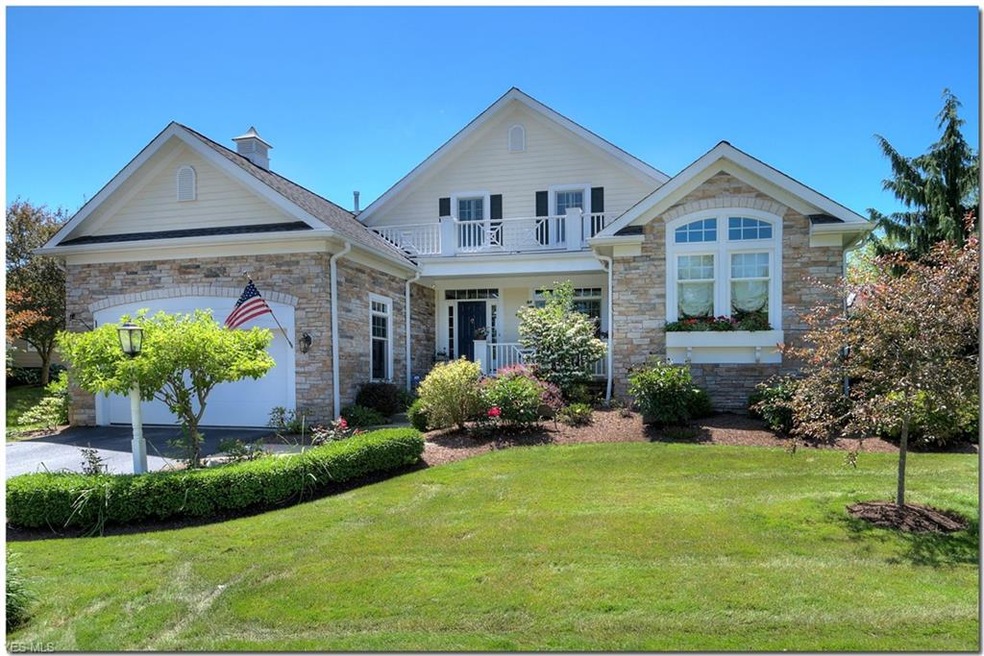 Welcome to 17412 Beech Grove Trail, an impeccably 