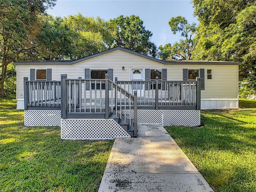 Front exposure of the home with an over sized deck
