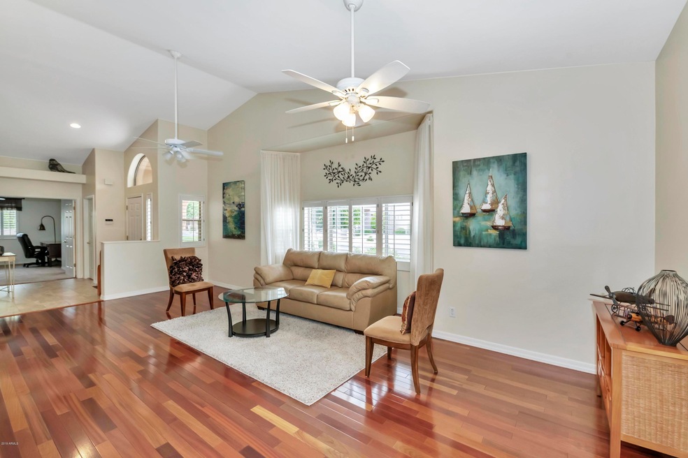 living room with cherry wood floors