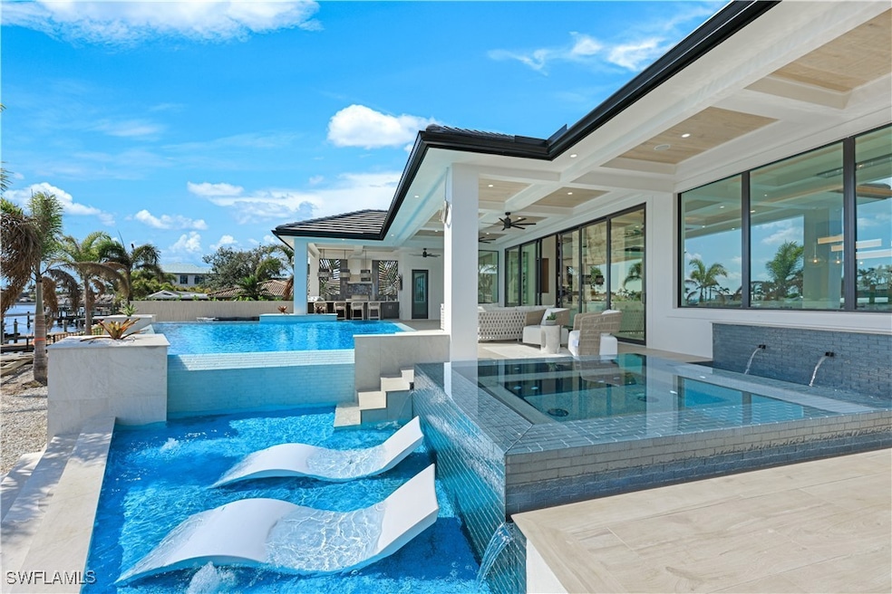 View of pool with a fenced in pool, a patio area,