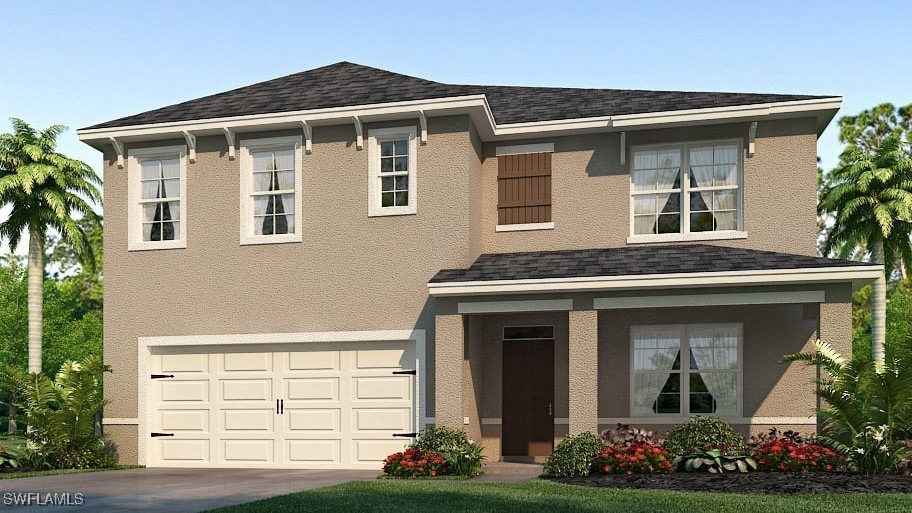 View of front of house with an attached garage, st