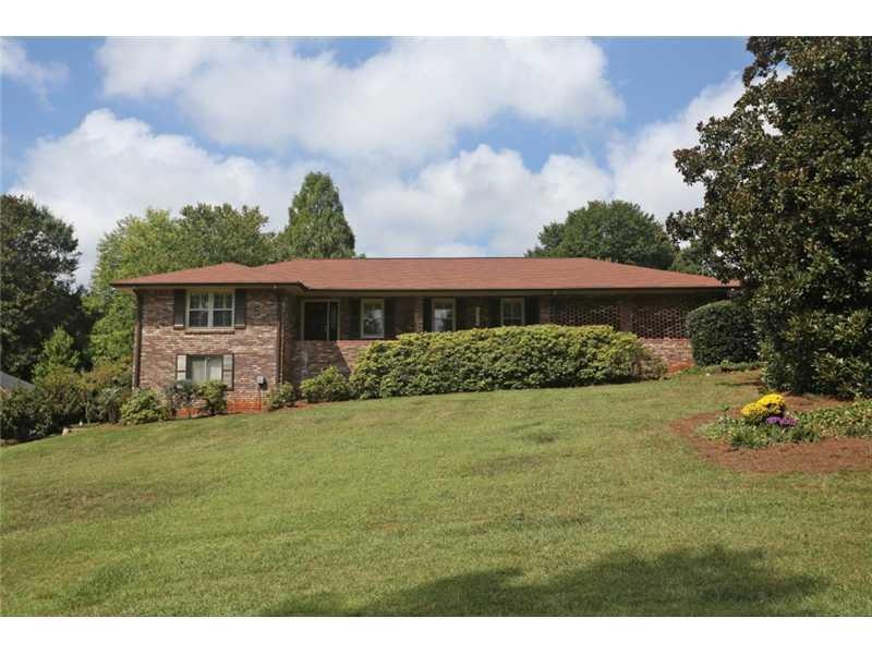 Exterior Front. Welcome to this Spacious Brick Hom