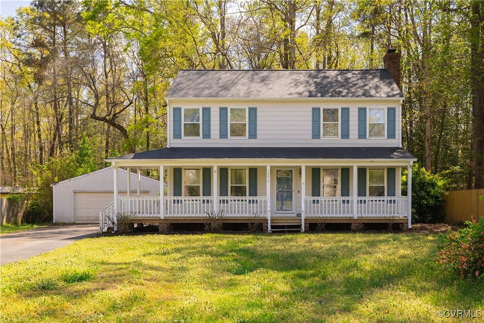 View of front facade featuring covered porch, a de