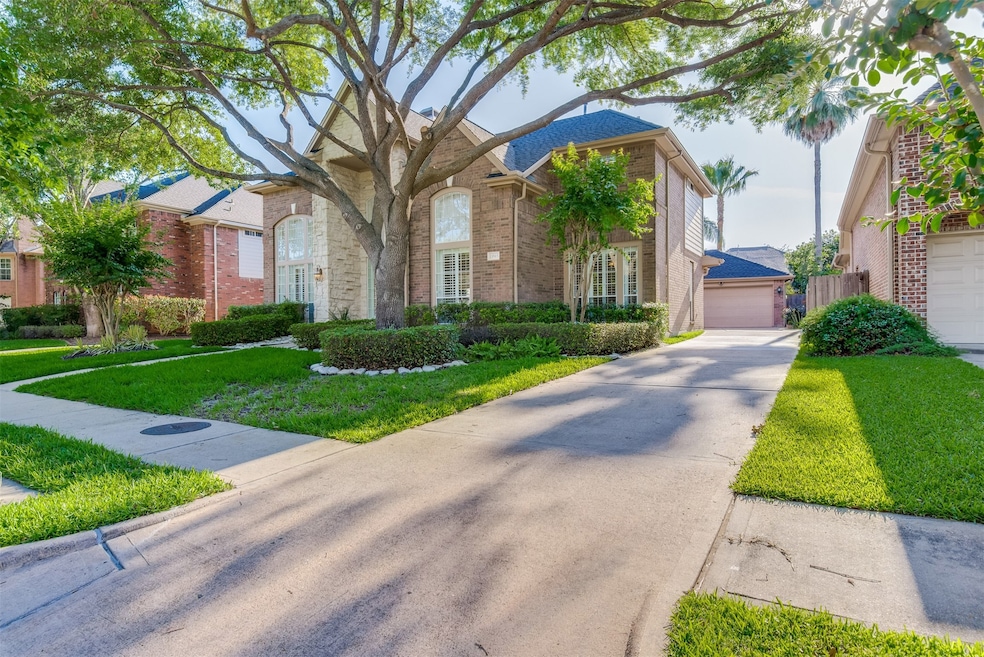 Welcome home to 13515 Tracewood Bend in the gated