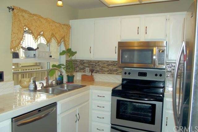 Spacious Kitchen with Stainless Steel Appliances, 