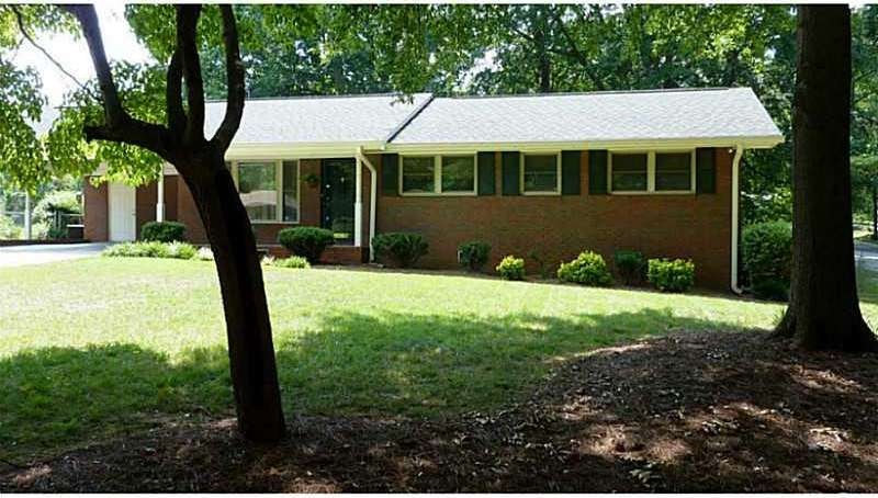 Exterior Front. Four sides brick ranch with new ro
