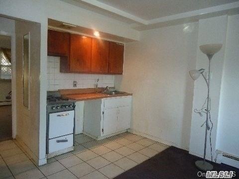 9322 243rd St unit 1, Bellerose, NY 11426 - photo 1