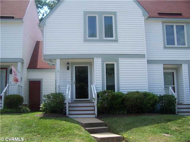 Exterior Front - Building has new vinyl siding and