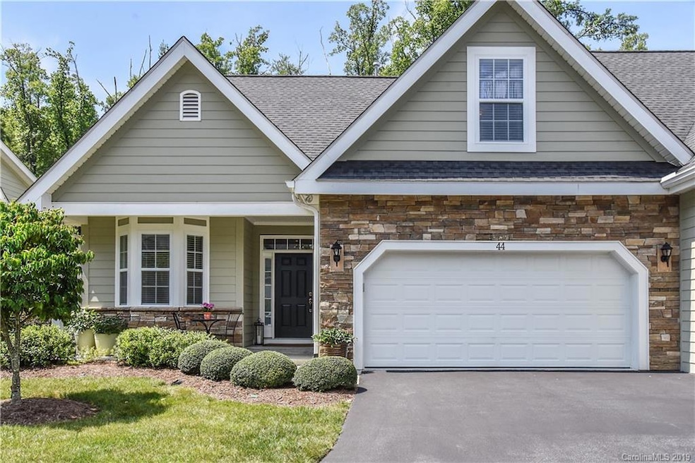 Front of Condominium with 2 Car Garage.