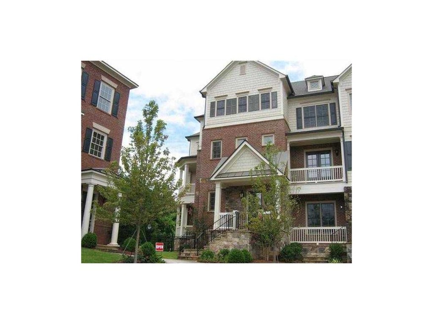 Exterior Front. End Unit with inviting covered por