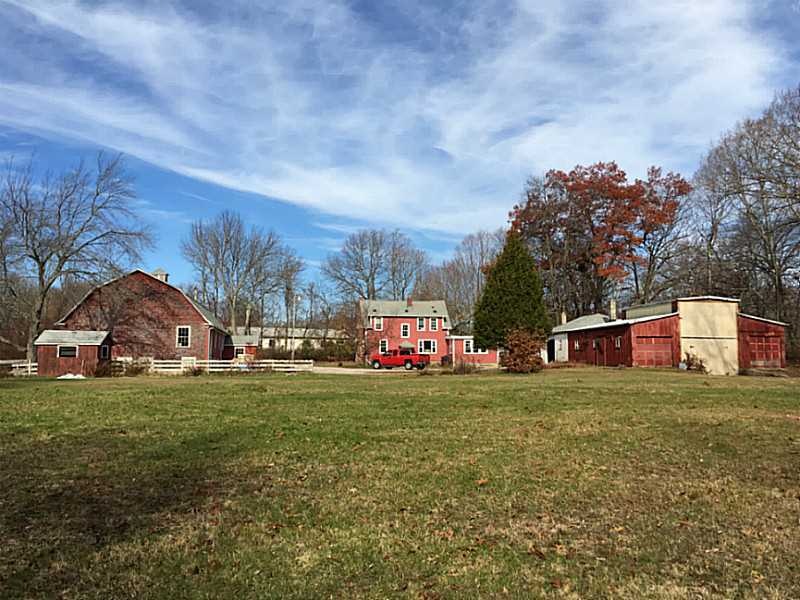 Exterior Back. beautiful riverfront property with