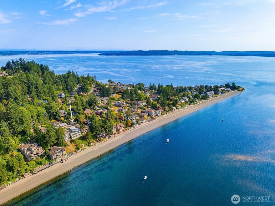 You are invited to take part in the Three Tree Point's rejuvenating beach lifestyle with this Puget Sound property coming with 60' of private shoreline and golden western exposure.