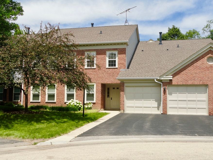 Professionally landscaped, attached one car garage