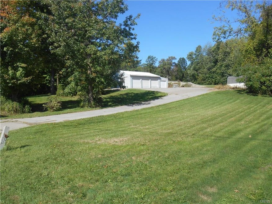 Almost 2 acres in West Genesee School District. Al