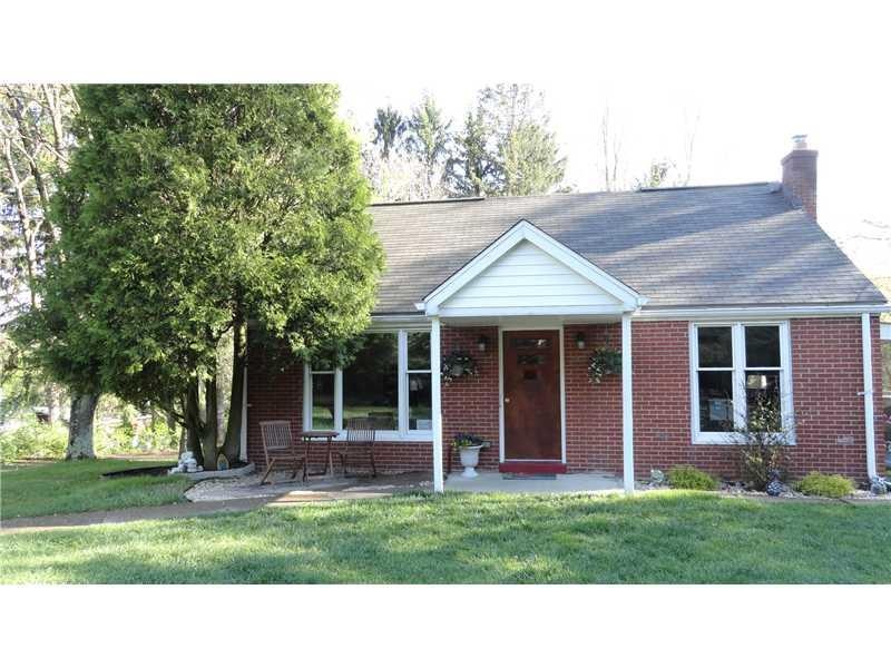 Exterior Front. Charming brick Cape Cod in Hampton