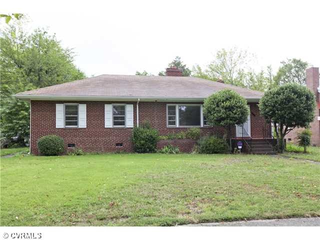 Exterior Front - Large lot with off-street parking in rear.
