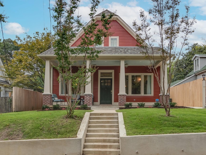 View of front facade featuring a porch, roof with 