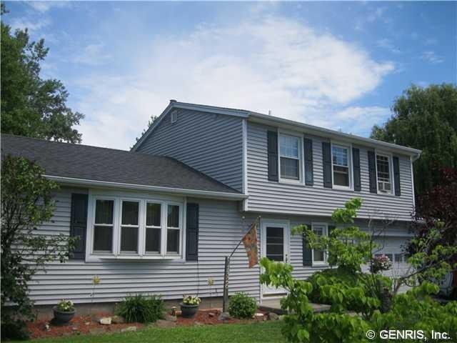 Exterior Front Charming Colonial split with newer 