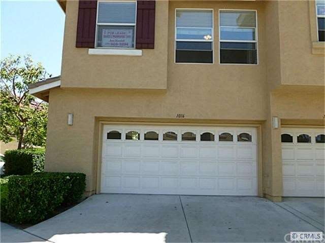 End unit, two car attached garage.  Nice long driv