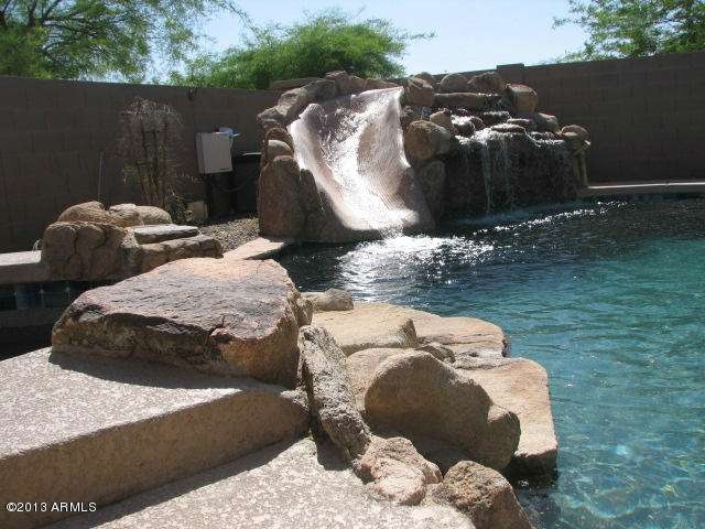 Slide, waterfall and hot tub