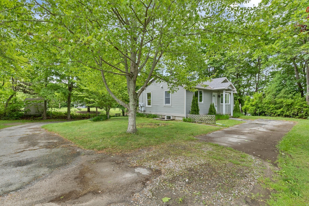 Upper Unit, The road to the left leads to the lakefront area and the lower level unit