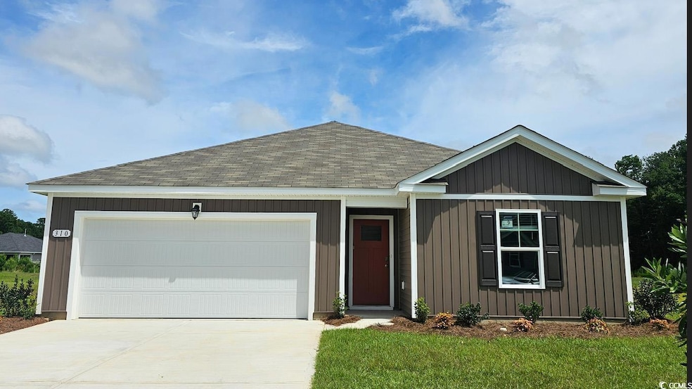 View of front of home with roof with shingles, dri