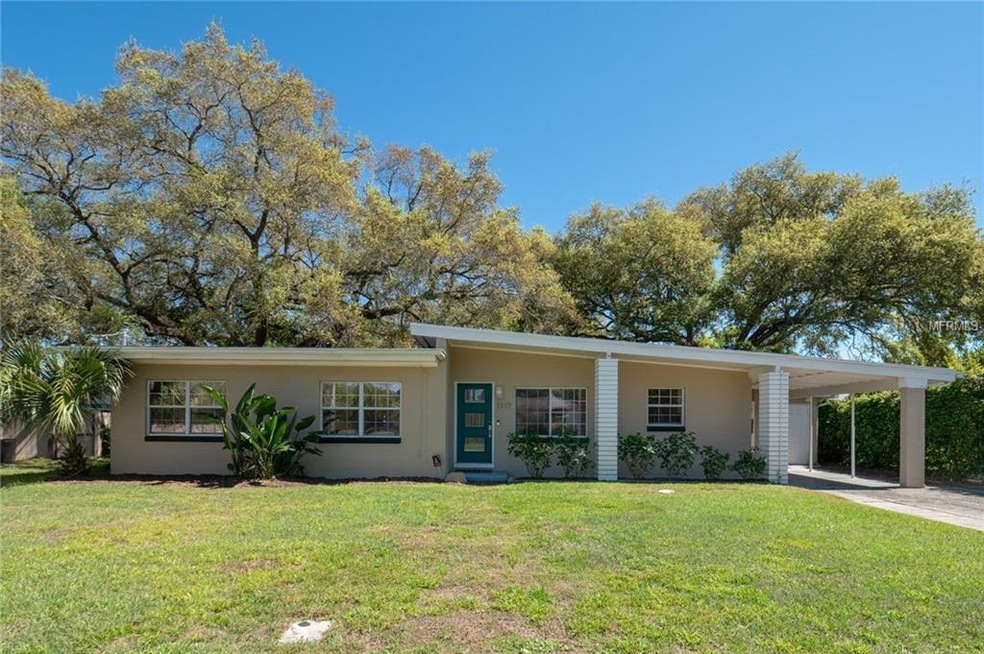 Mid-Century Mod abode in the award-winning Audubon Park Garden District.