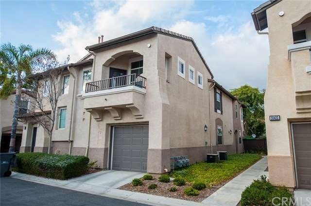 Walk down the sidewalk and front door to the unit 