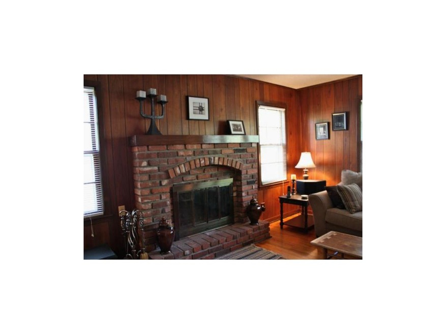 Living room fireplace and beautiful hardwoods