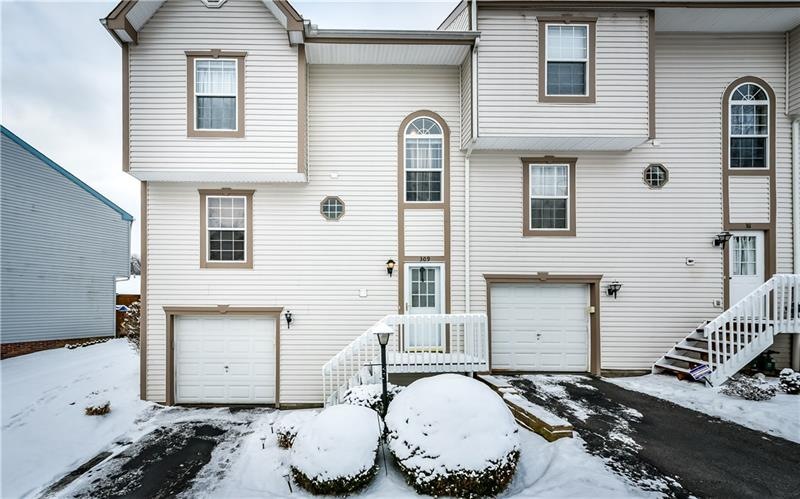 Updated spacious end unit townhome with low HOA du