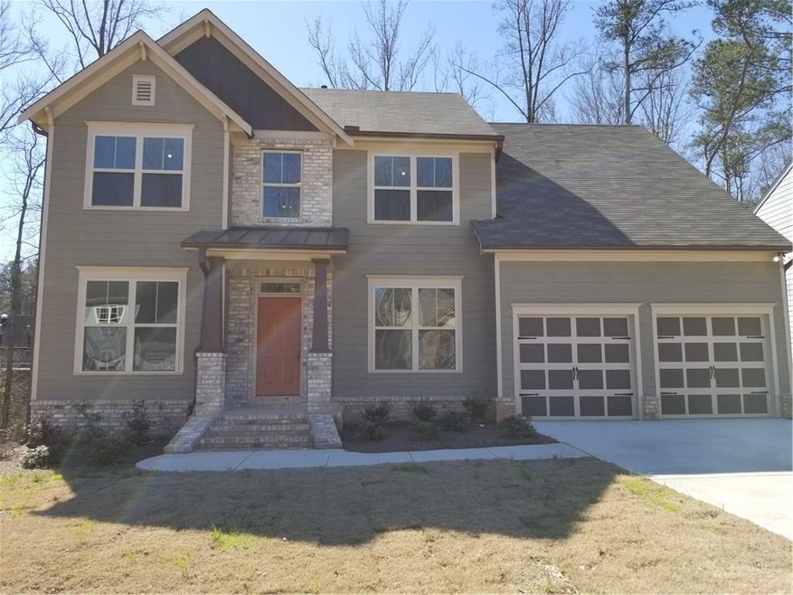 Curb appeal galore!  From the rich brown accents t