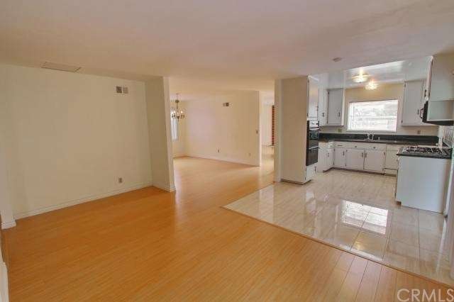 A open floor plan with fireplace in the living roo