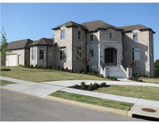 Exterior Front. BEAUTIFUL  BRICK & STONE ENTRANCE,CAST STONE ON COLUMNS AND AROUND ENTRY DOOR.PROFESSONAL LANDSCAPED