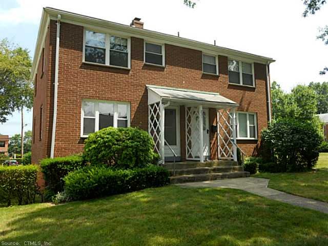 Exterior Front. Brick co-op, beautiful grounds, we