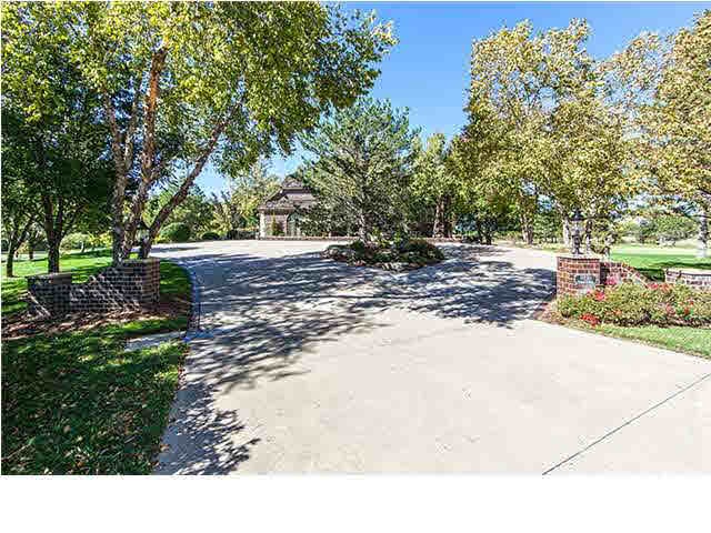 Circle Drive and Entry sits secluded from road.