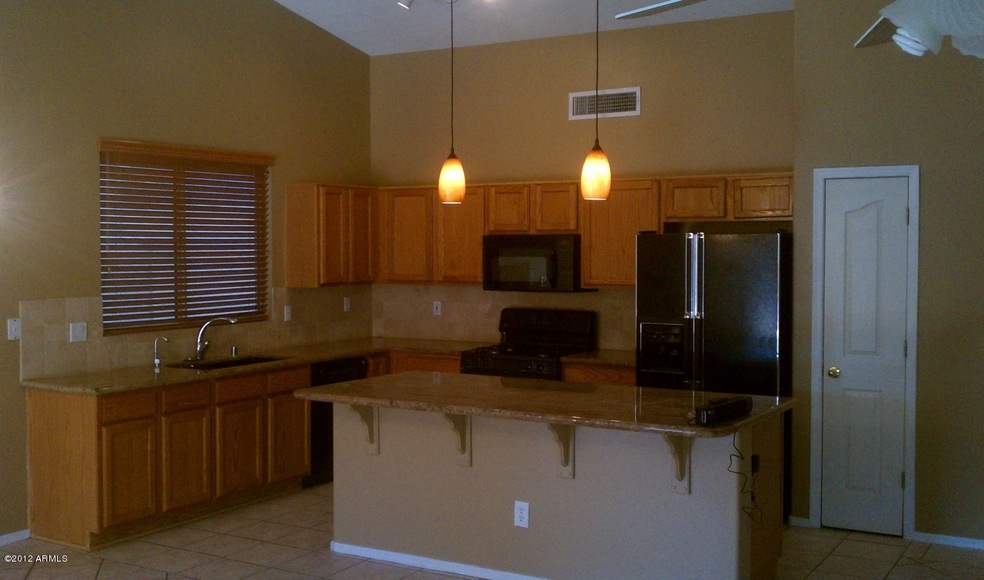 KITCHEN W/ GRANITE AND LARGE ISLAND