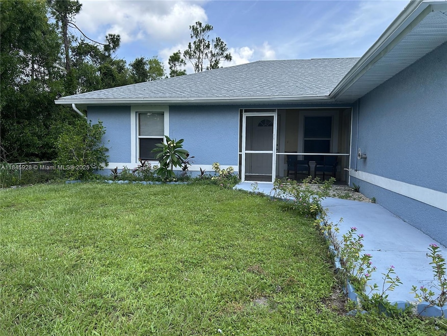 2702 Robin Ave S unit 2702, Lehigh Acres, FL 33973 - photo 1