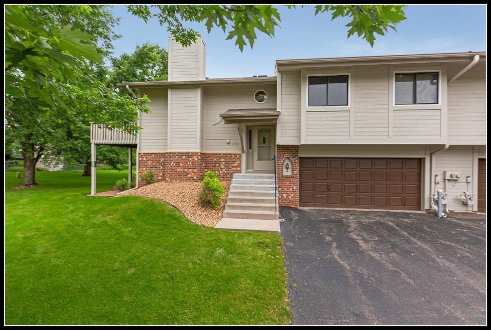 Welcome home to 12996 82nd Avenue North in Maple G