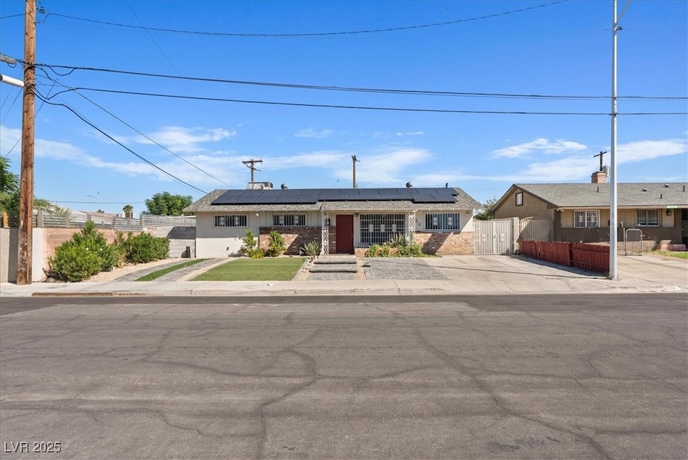View of front of home featuring solar panels