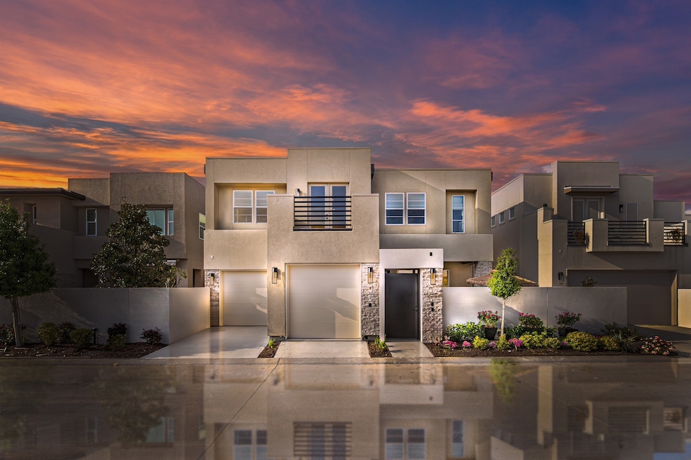This modern two-story home features a sleek facade