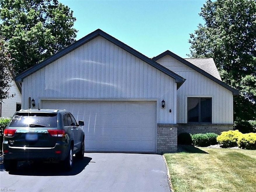 View of front of property featuring garage