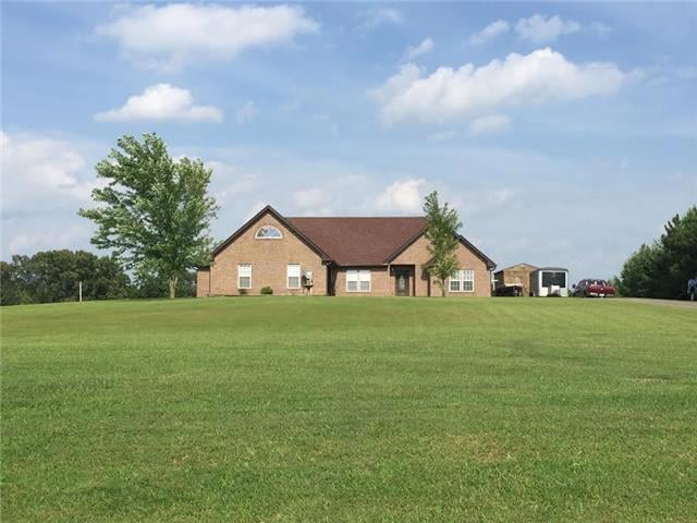 Front View of this all brick home on 5.68 acres.  