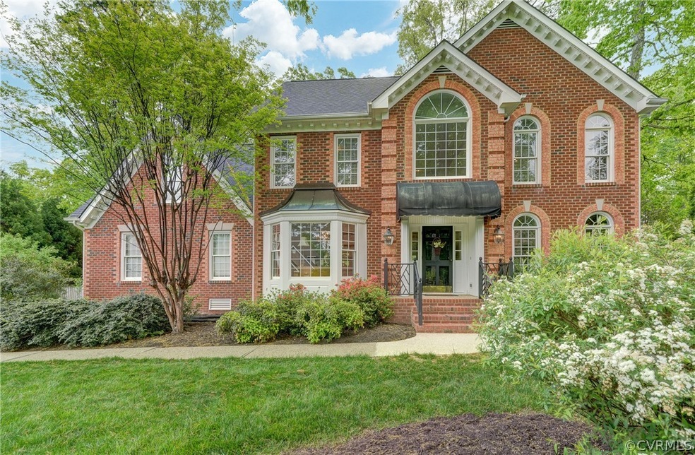 View of front of property with a front yard