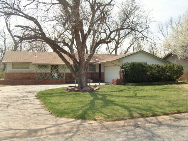 Front entrance and side entrance beside garage.